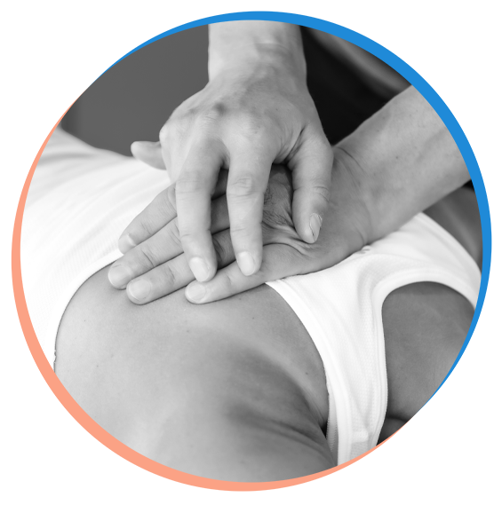 Mike pressing on a elite athletes back during sports physiotherapy Mike pressing on a elite athletes back during sports physiotherapy